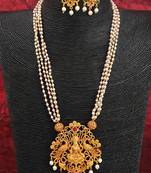 Ruby green clustered pearl peacock design god laxmi temple long pendant set