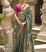 Banarasi silk blend Jacquard Saree In Teal Green With Unstiched Blouse