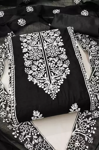 Women's lovely black and green color embrodiered and fancy border combo dress material