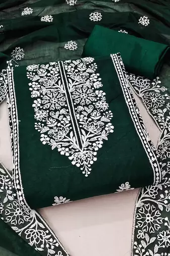 Women's lovely black and green color embrodiered and fancy border combo dress material