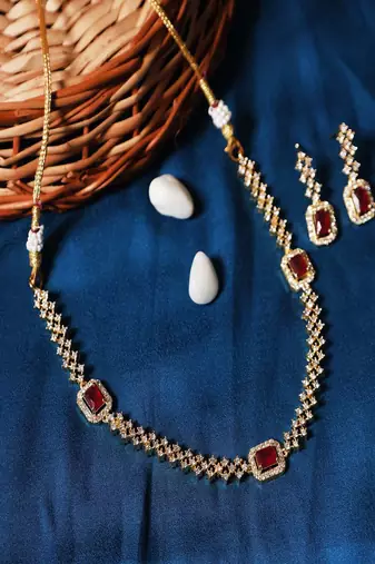 Red three stone american diamond necklace set