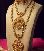 Opulent gold plated red stone embellished jewelry set
