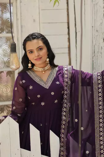 Purple colour heavy sequins and zari partywear gown with dupatta