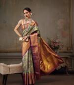 Bottle Green Floral Woven Design Silk Blend Saree