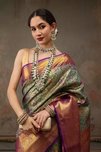 Bottle Green Floral Woven Design Silk Blend Saree