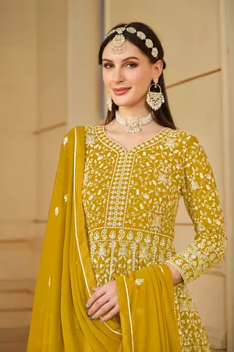 Yellow embroidered faux georgette salwar suit with Dupatta