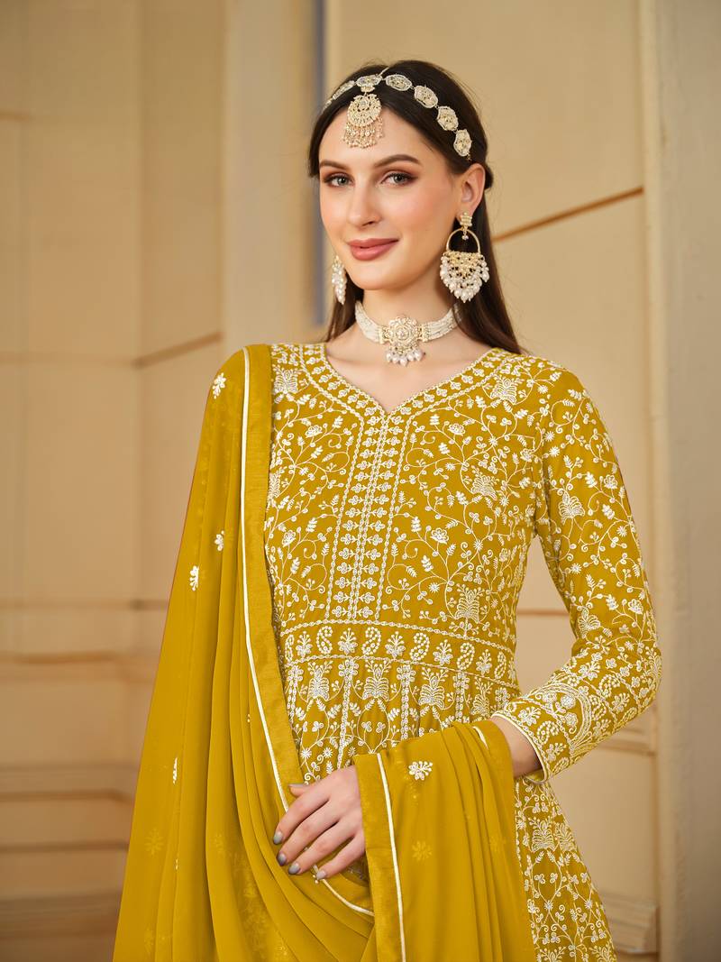 Yellow color faux georgette salwar suits with faux georgette dupatta