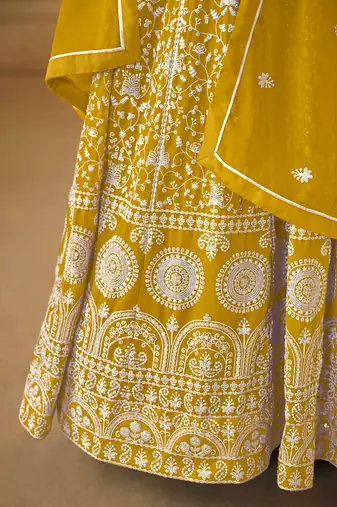 Yellow embroidered faux georgette salwar suit with Dupatta