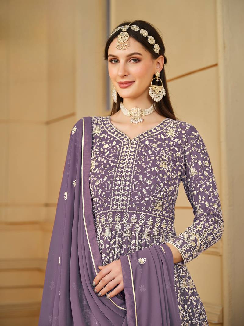Purple color faux georgette salwar suits with faux georgette dupatta
