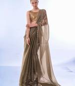 Metalic Colour Organza Fabric Saree With Tassels And Unstitched Blouse