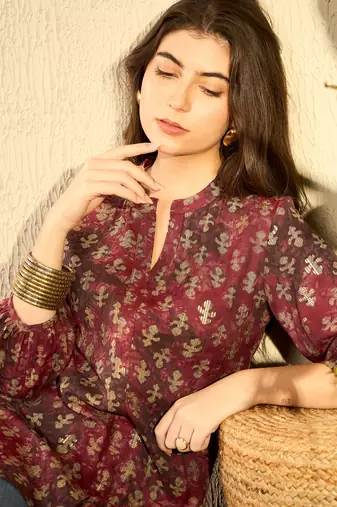 maroon abstract printed regular tunic