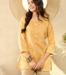 women yellow cotton blend bandhani printed regular tunic