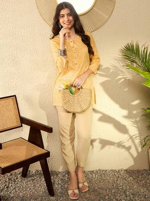women yellow cotton blend bandhani printed regular tunic 1