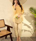 women yellow cotton blend bandhani printed regular tunic