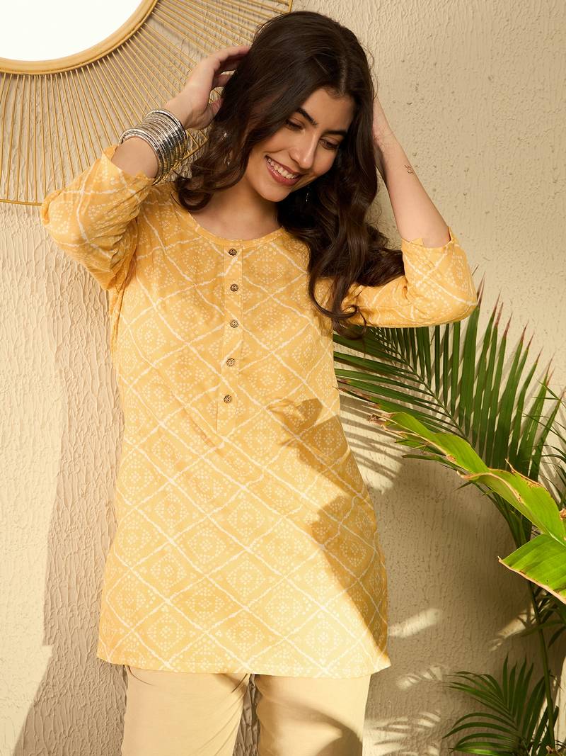 women yellow cotton blend bandhani printed regular tunic
