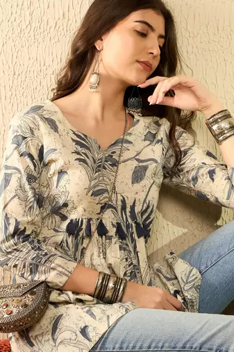 women off white cotton blend floral printed peplum tunic