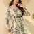 women off white cotton blend floral printed peplum tunic