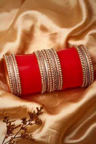 Set Of 24 Gold-Plated Red AD Stone Studded Chuda Set