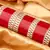 Women Set of 48 Maroon & Gold-Plated Bridal Chuda Bangles