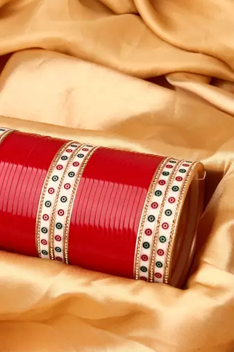 Women Set of 48 Maroon & Gold-Plated Bridal Chuda Bangles