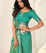 Teal cotton chevron ajrak print woven zari border tassels saree with unstitched blouse piece