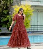 Brown colour georgette fabric smart printed partywear gown for trendy girls