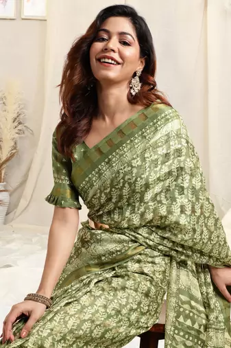 Light green cotton block print golden zari border tassels saree with unstitched blouse piece