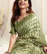 Light green cotton block print golden zari border tassels saree with unstitched blouse piece