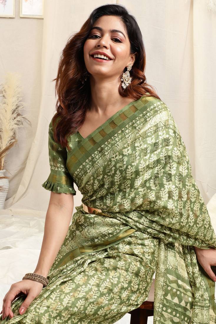 Light green cotton block print golden zari border tassels saree with unstitched blouse piece