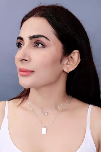   rhodium-plated shaped cz studded layered chain necklace