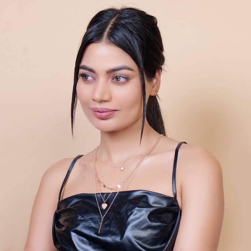   rosegold-plated star shaped cz studded layered chain necklace