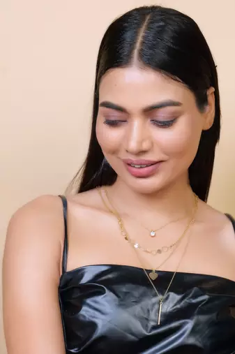   gold-plated star shaped cz studded layered chain necklace