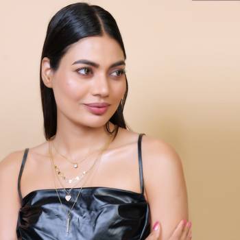   gold-plated star shaped cz studded layered chain necklace 4