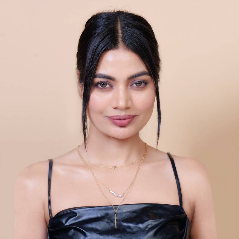   gold-plated star shaped cz studded layered chain necklace