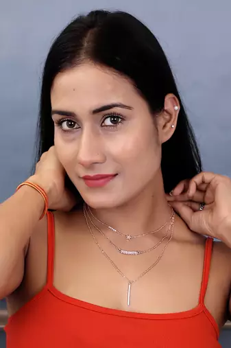   rosegold-plated star shaped cz studded layered chain necklace