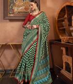 Elora Soft Silk Chevron Pattern With Foil Printed Patola Saree (Dark Green)