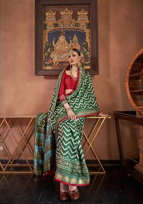 Elora Soft Silk Chevron Pattern With Foil Printed Patola Saree (Dark Green) 2