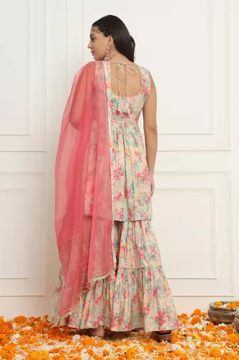 Off- white and pink floral peplum kurta sharara set with dupatta