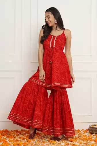 Red bandhani peplum top with sharara pants set