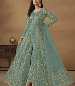 Net embroidered zari work pant style salwar suit in turquoise
