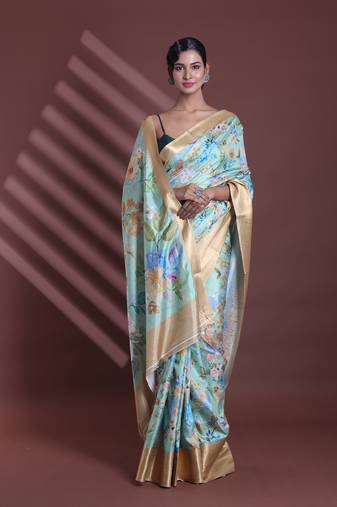 Light green floral print silk soft saree with zari border