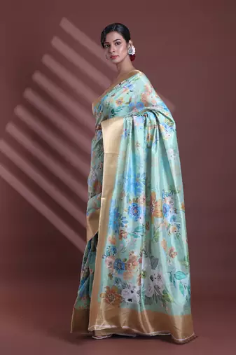 Light green floral print silk soft saree with zari border