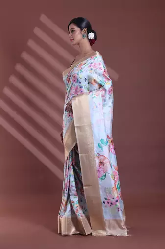 Sky blue floral print silk soft saree with zari border
