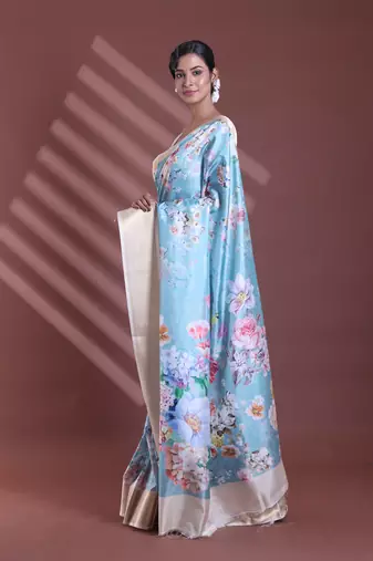 Sky blue floral print silk soft saree with zari border