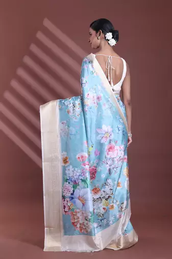 Sky blue floral print silk soft saree with zari border