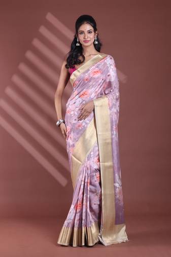 Nude pink floral print silk soft saree with zari border