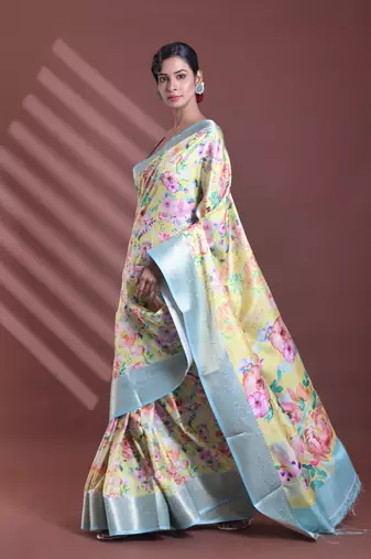 Cream floral print silk soft saree with zari border
