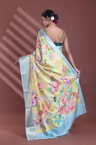 Cream floral print silk soft saree with zari border