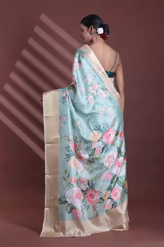 Mint green floral print silk soft saree with zari border
