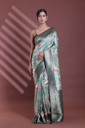 Pistachio green floral print silk soft saree with zari border